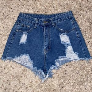 90s Distressed frayed medium wash jean shorts